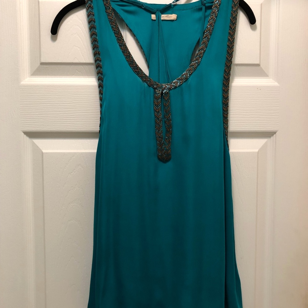 NWT. Stunning Sleeveless silk top with sequins